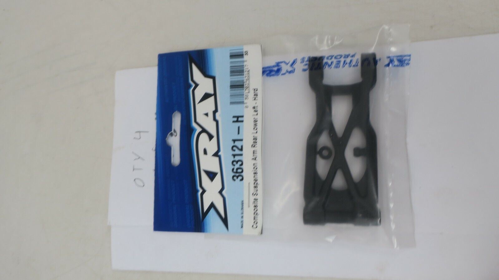 XRAY 363121-H - Composite Suspension Arm Rear Lower Left - Hard [XR-363121-H] - WISE GUYS HOBBIES LLC