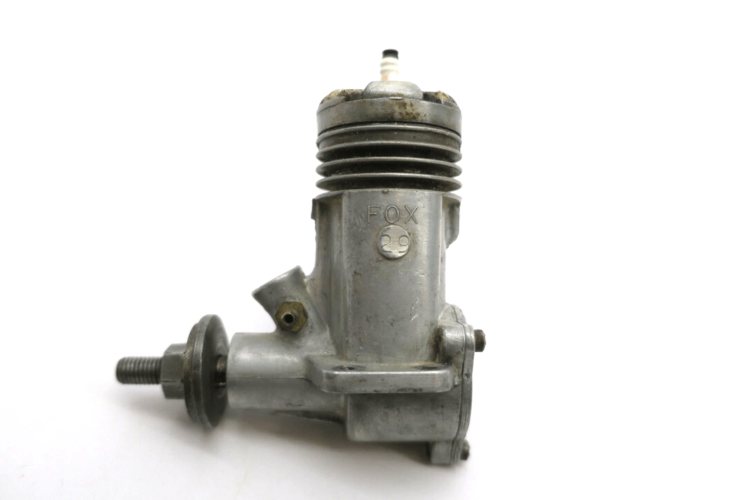 VTG FOX 29 MODEL AIRPLANE ENGINE (c.1950s)+ CHAMPION VG-1 GLOW PLUG - WISE GUYS HOBBIES LLC